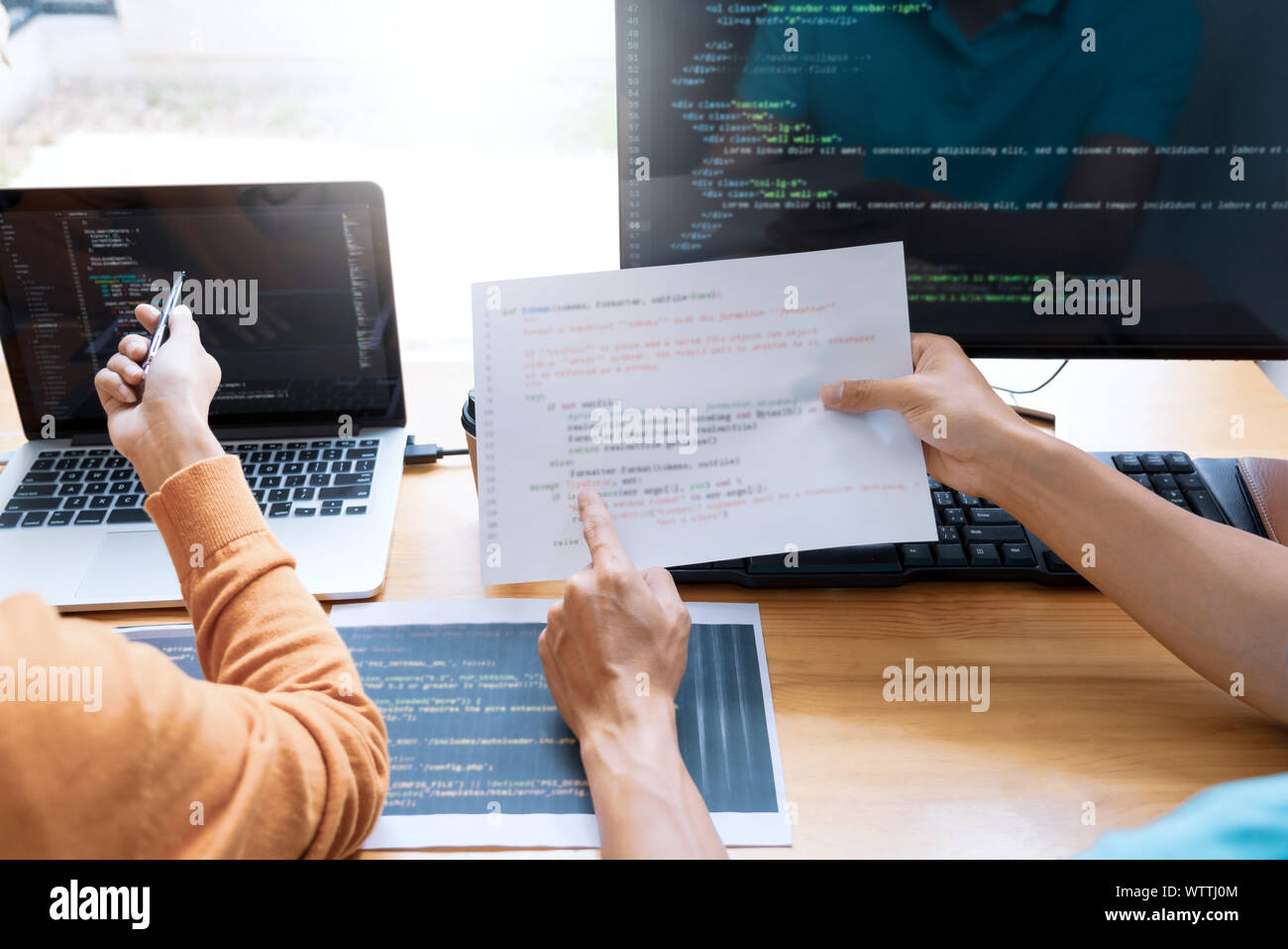 Asian team Outsource Developer Looking Screen Programming Code Working ...