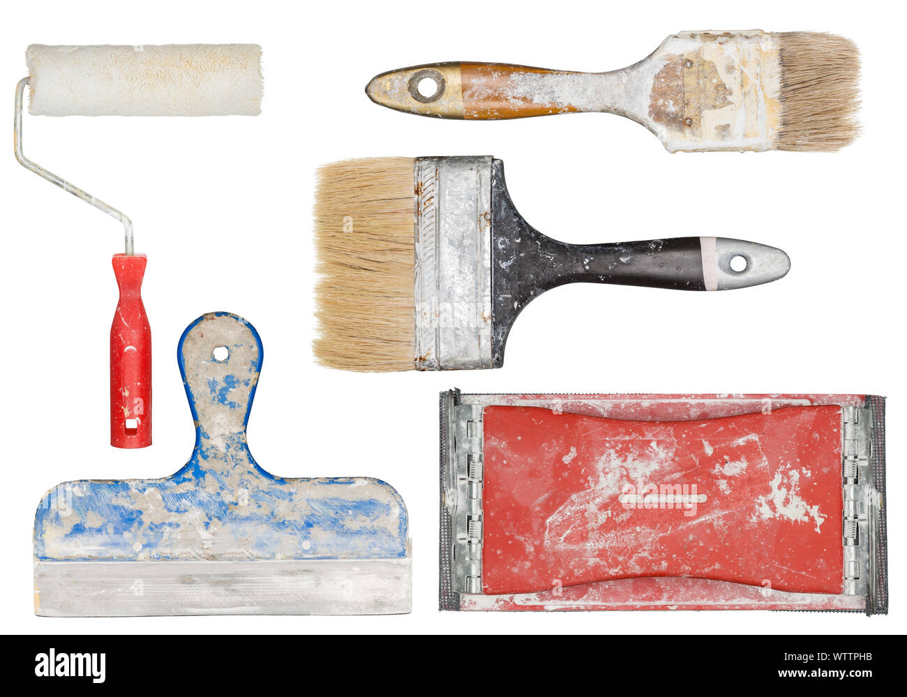 Isolated used painting tools. Paint brushes, roller and spatula. Stock Photo