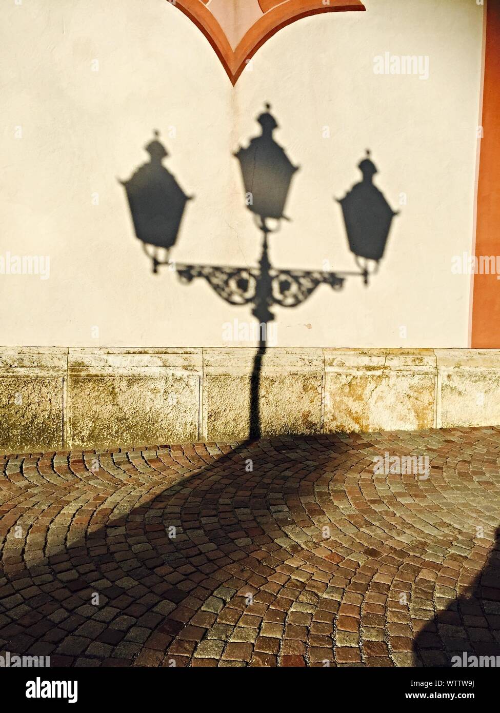 Street Light Shadow On Wall Stock Photo