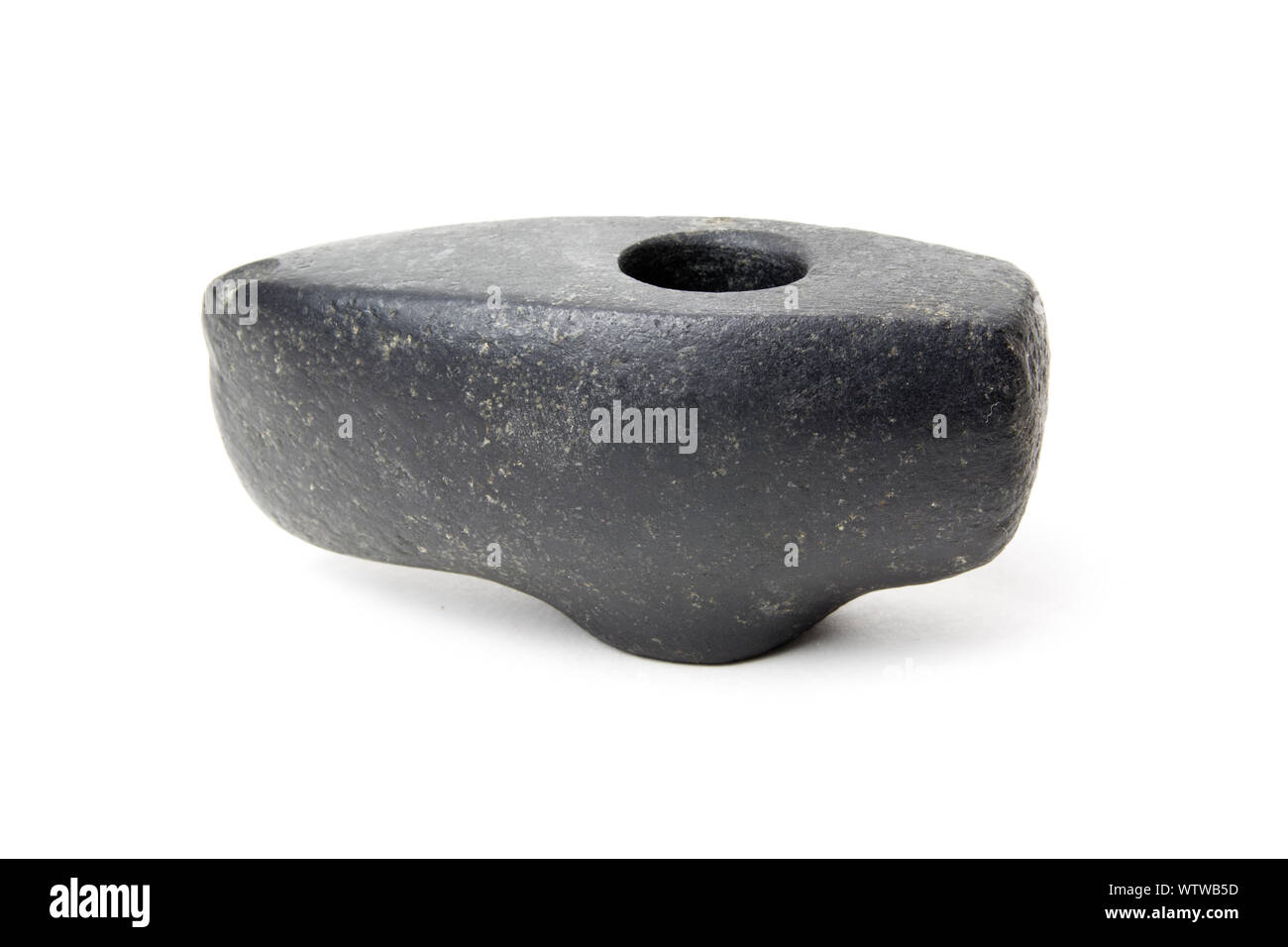 An old stone Hammer on white background . Ancient Axe female for