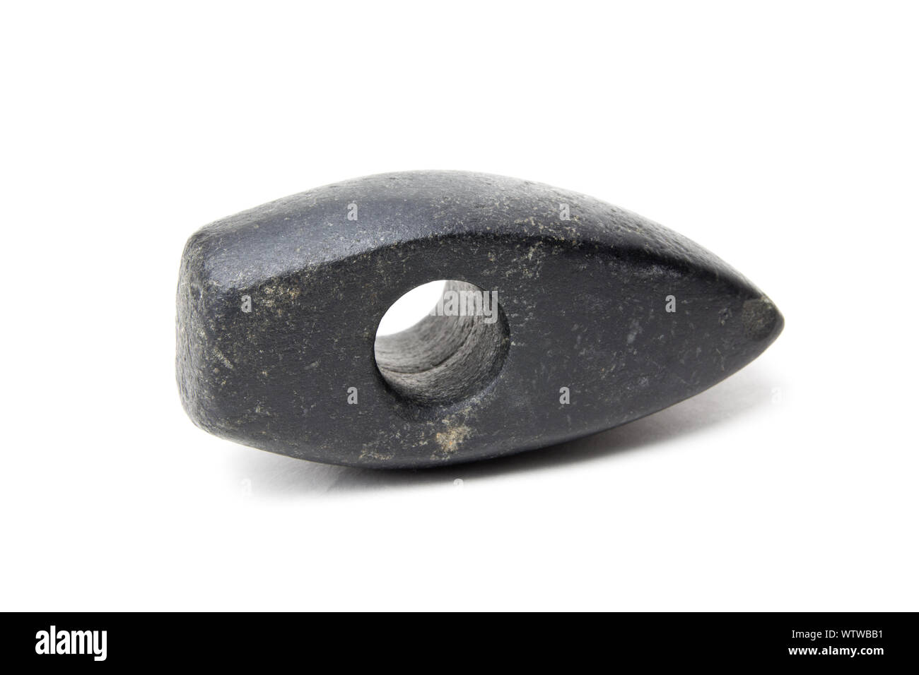 An old stone Hammer on white background . Ancient Axe female for