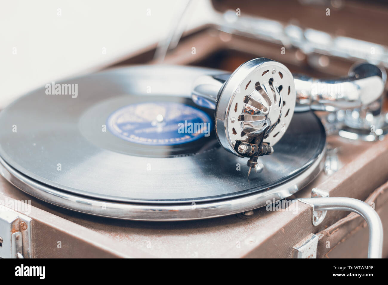 Old retro portable gramophone closeup, macro shot Stock Photo