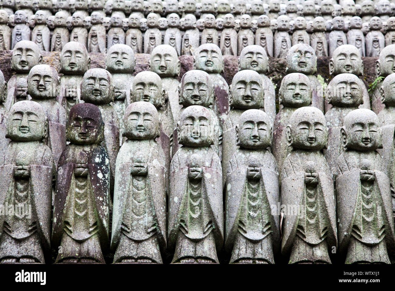 Rows of stone Jizo statues at Hasedera Temple, Kamakura, Japan Stock