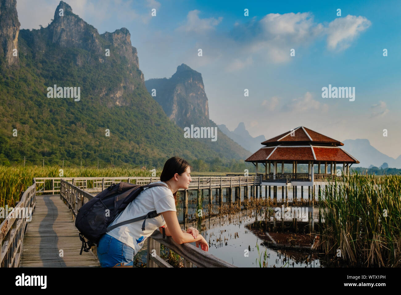 Young woman relaxing in park. Sam Roi Yod National Park, Thailand Stock Photo
