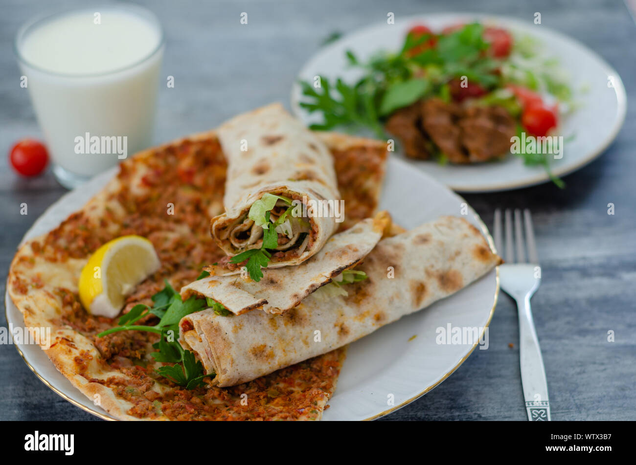 Traditional delicious Turkish food; Turkish lahmacun.top view. Stock Photo