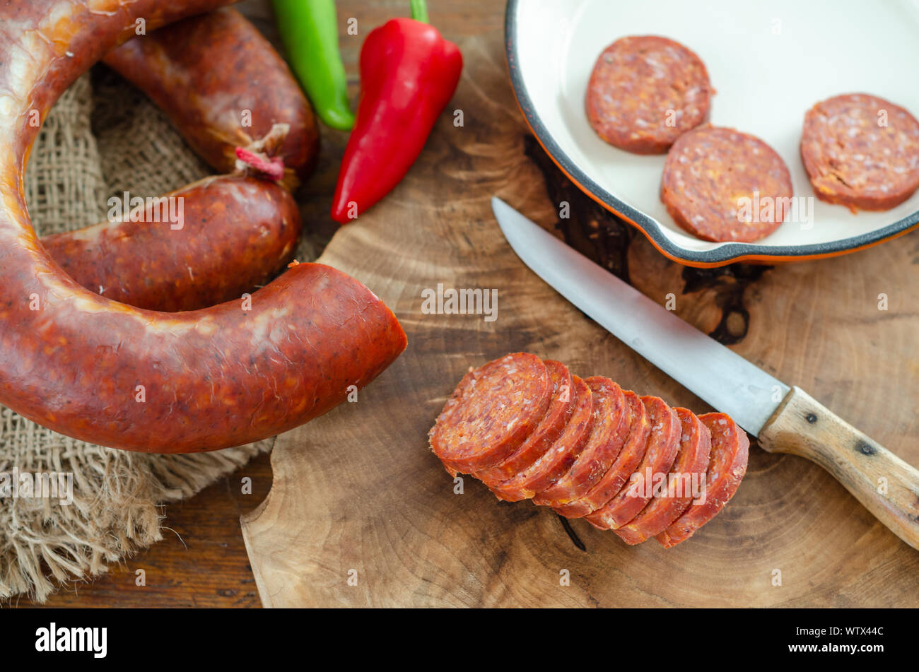 Turkish sausage sucuk on a cutting board,top view Stock Photo Alamy