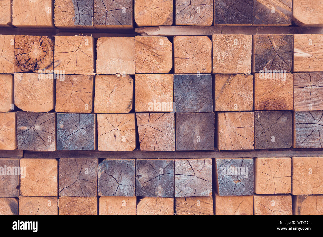 Closeup of stack of raw wooden planks Stock Photo