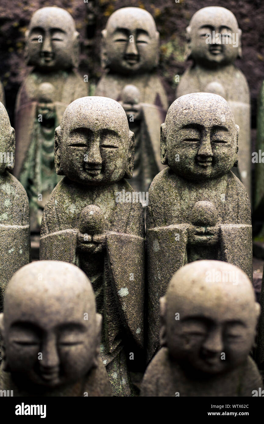 Rows of stone Jizo statues at Hasedera Temple, Kamakura, Japan Stock