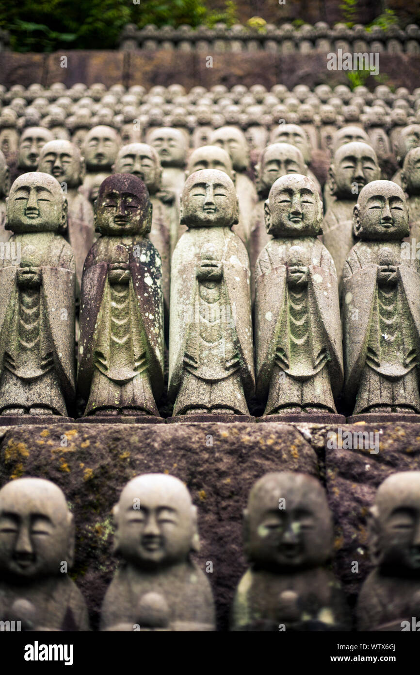 Rows of stone Jizo statues at Hasedera Temple, Kamakura, Japan Stock