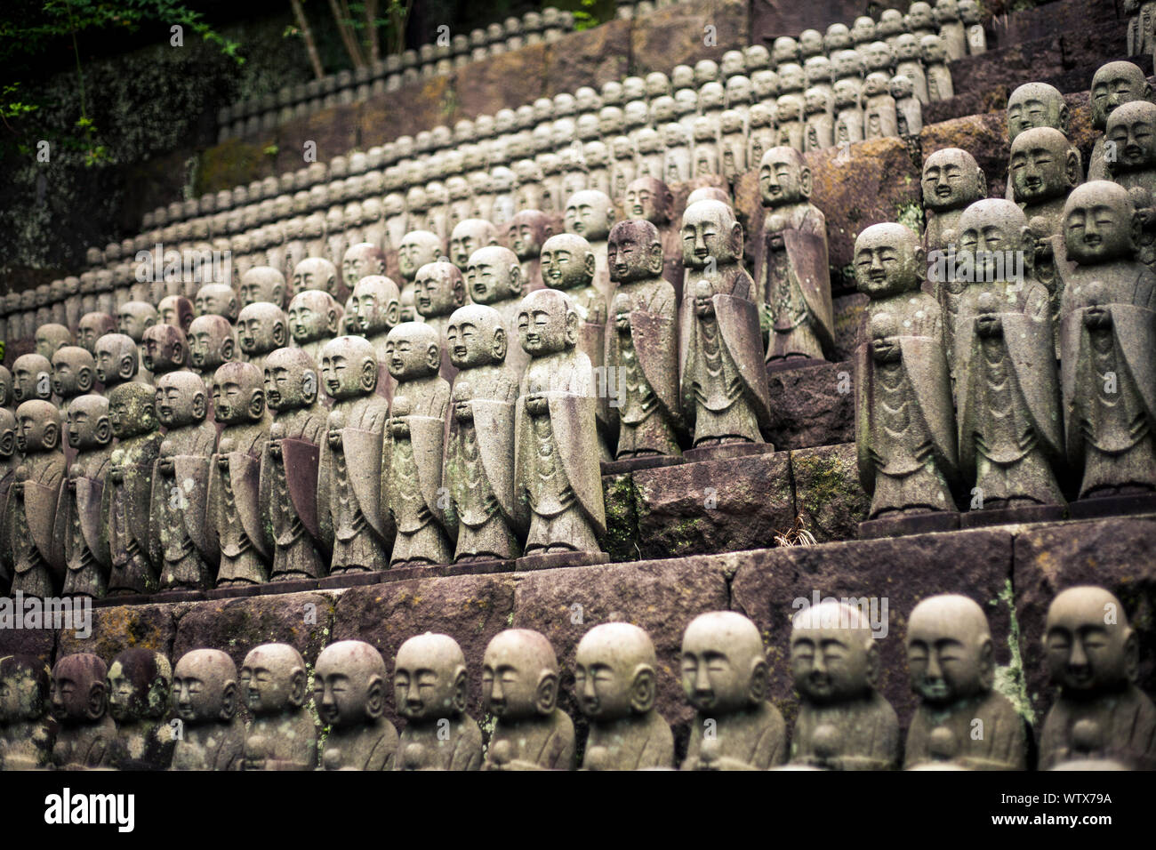 Rows of stone Jizo statues at Hasedera Temple, Kamakura, Japan Stock