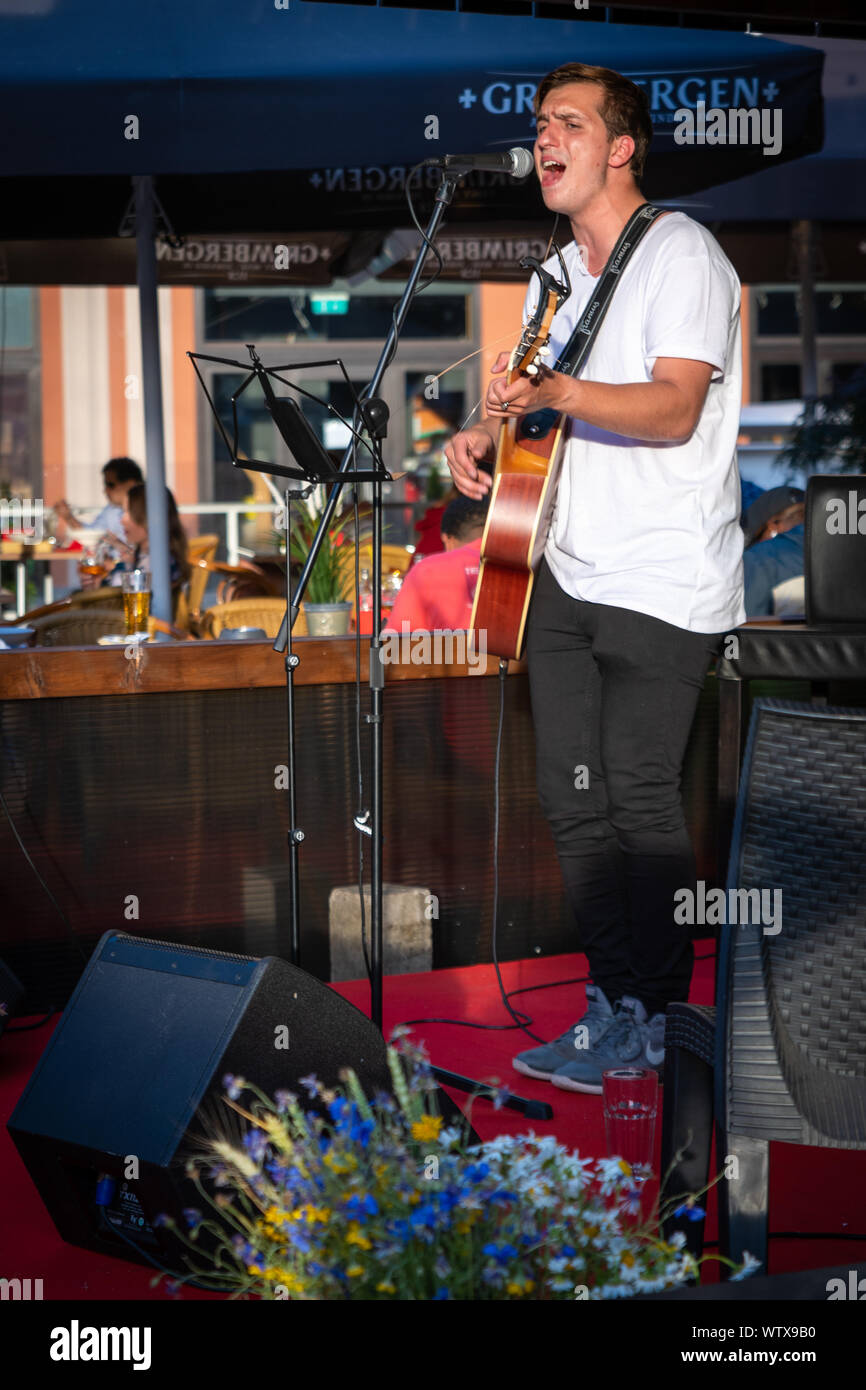 Singer Performing in a Bar, Riga, Latvia Stock Photo - Alamy