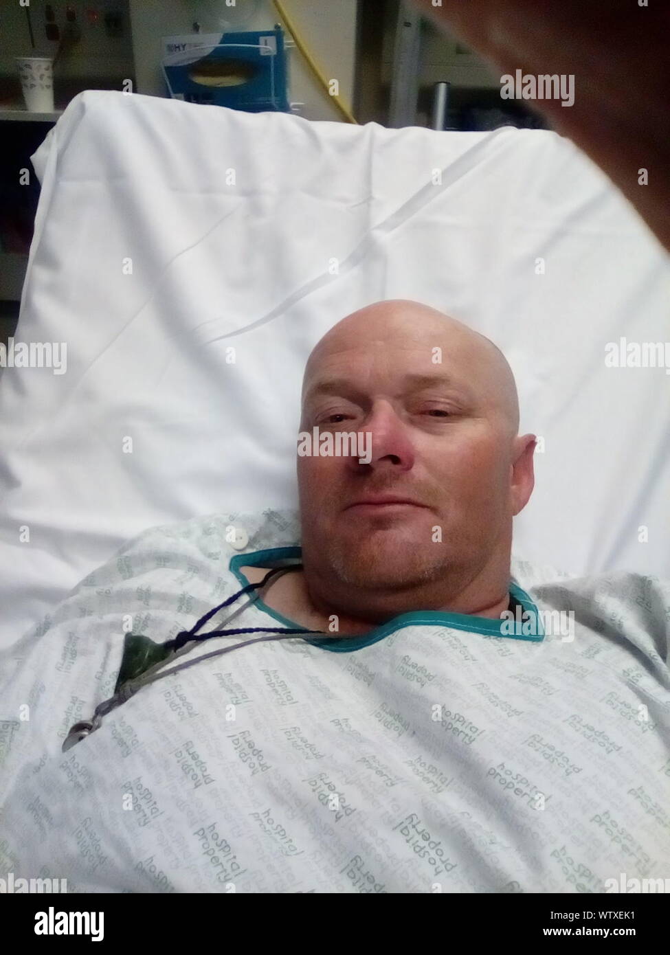 Hospital bed man lying hi-res stock photography and images - Alamy