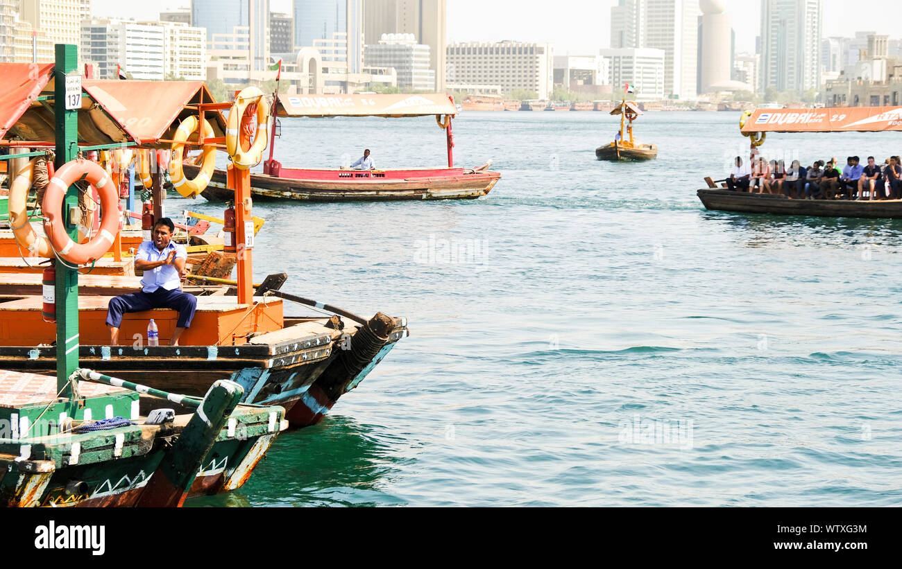 Dubai, United Arab Emirates - November 11, 2018: Water taxis are busy all day long on Dubai Creek, transporting people from one side to the other of o Stock Photo