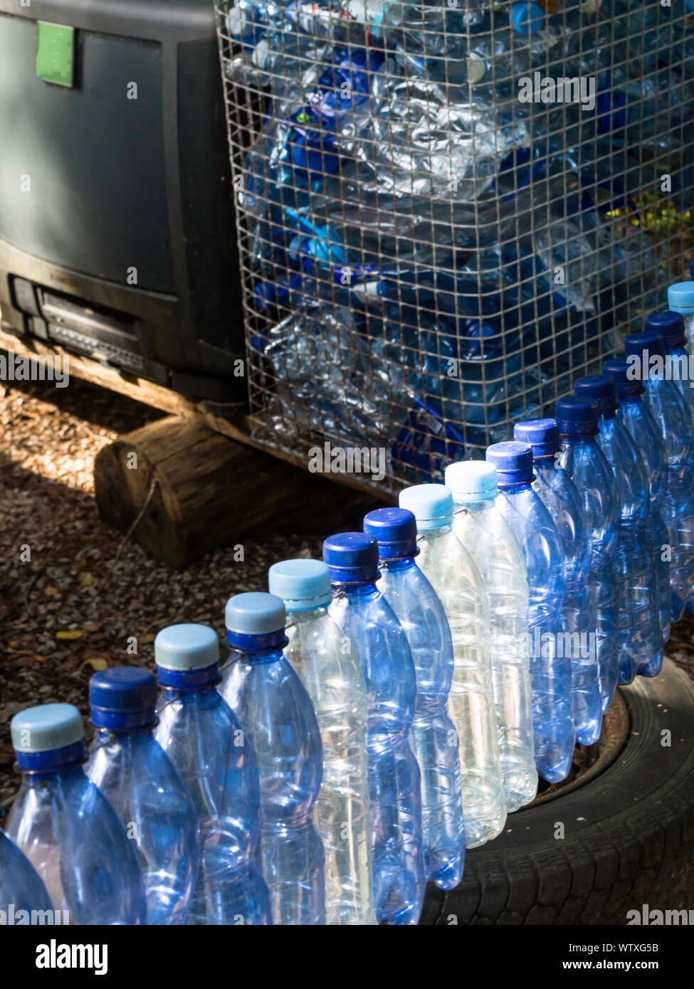 Composition with plastic bottles of mineral water. Plastic waste ...