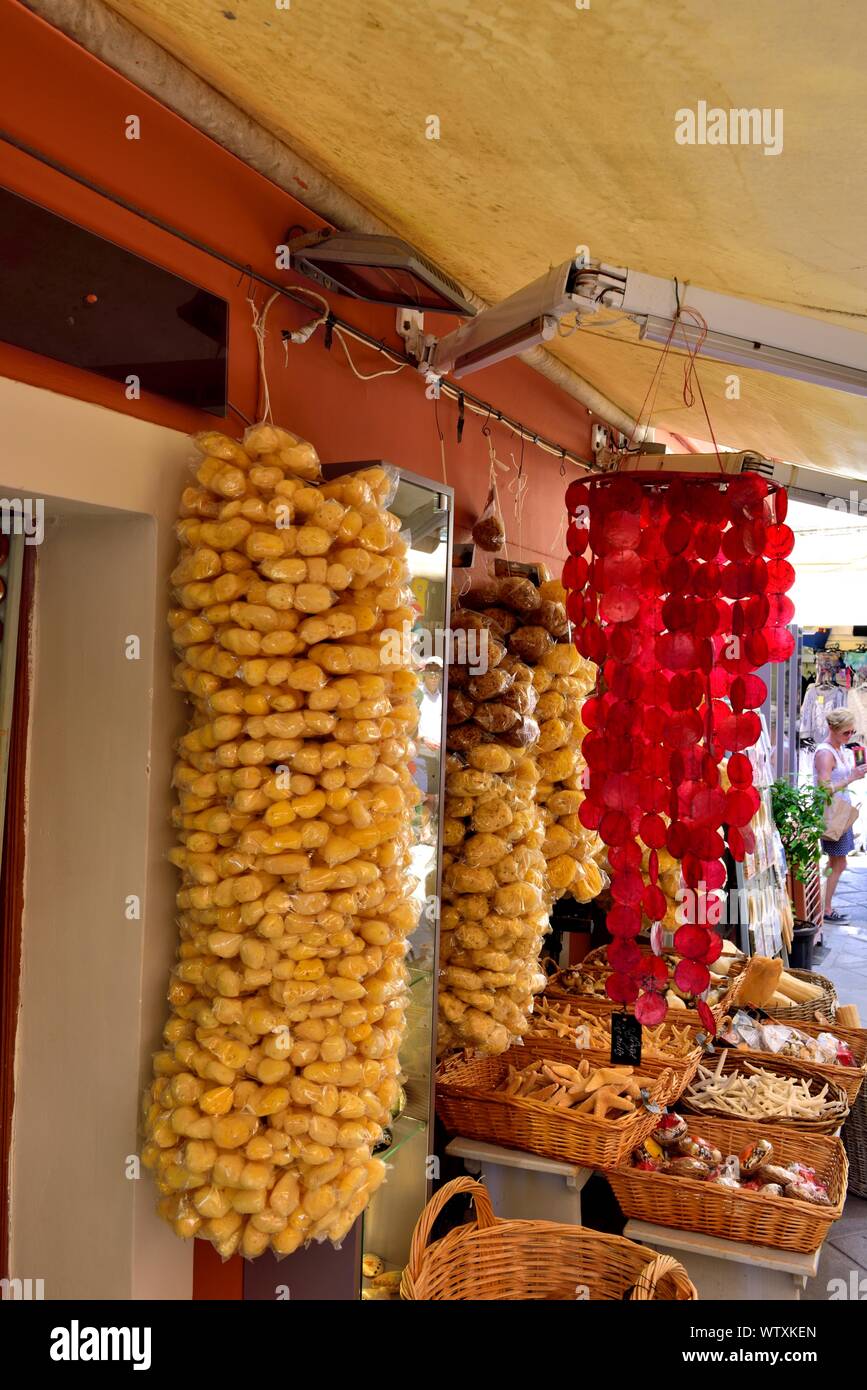 Gifts and souvenirs shop, selling natural sea sponge products and loofahs in Kerkyra, Corfu old Town, Greece Stock Photo