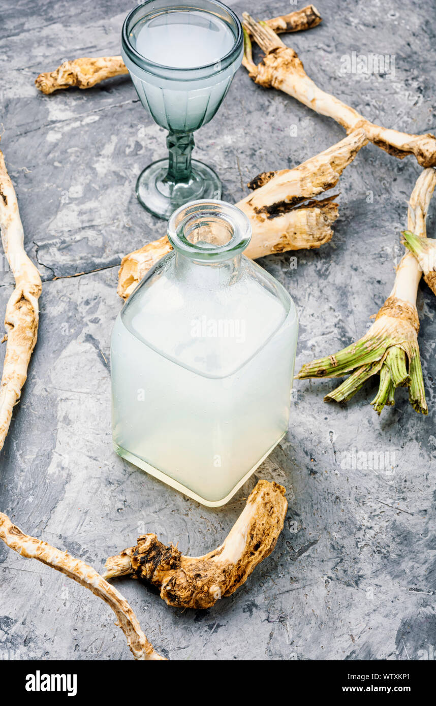 Preparation of alcohol tincture from fresh horseradish root Stock Photo