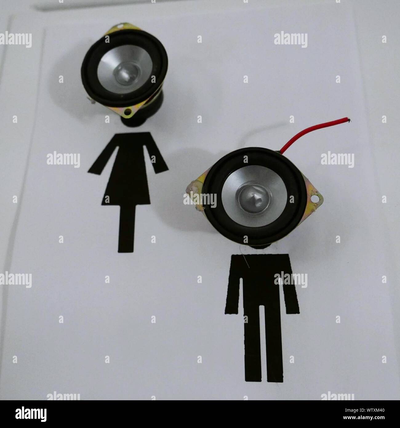 Speaker On Door With Restroom Signs Stock Photo Alamy