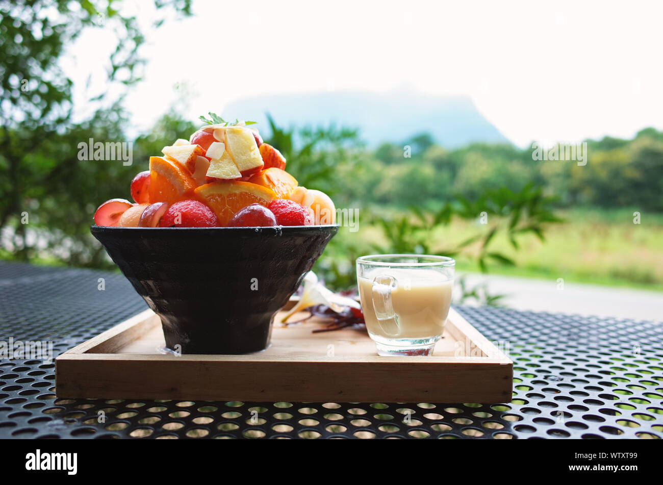 Fresh fruit salad with sauces Stock Photo Alamy
