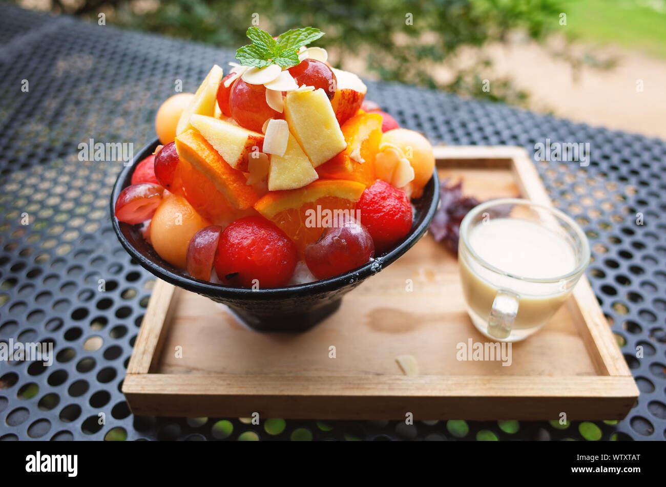 Fresh fruit salad with sauces Stock Photo Alamy