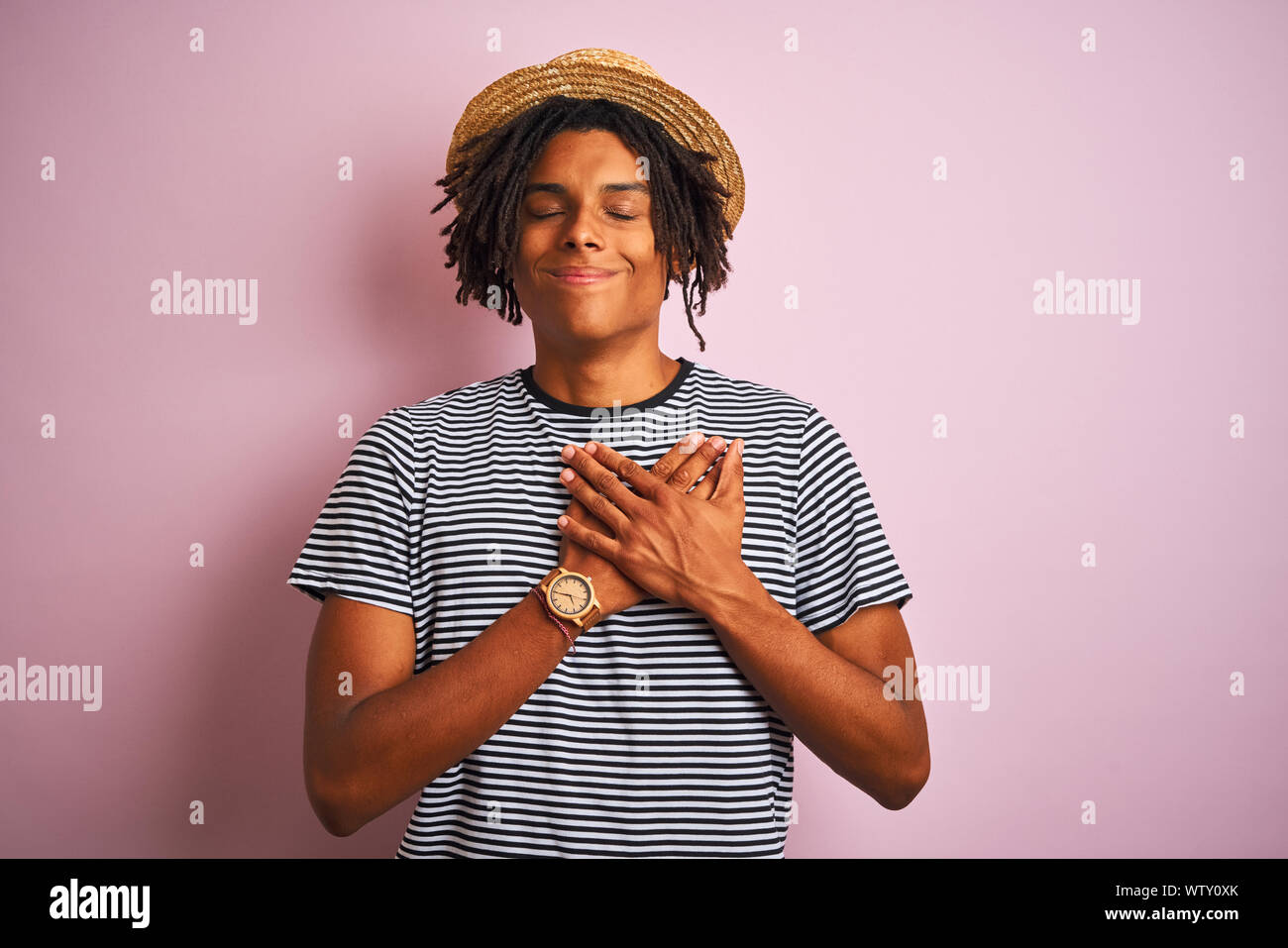 Dreadlocks Chest Afro american man with dreadlocks wearing navy t-shirt and hat over ...