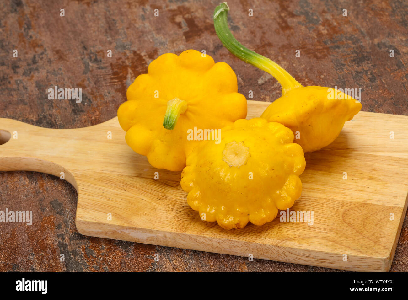 Fresh ripe patisson ready for cooking Stock Photo - Alamy