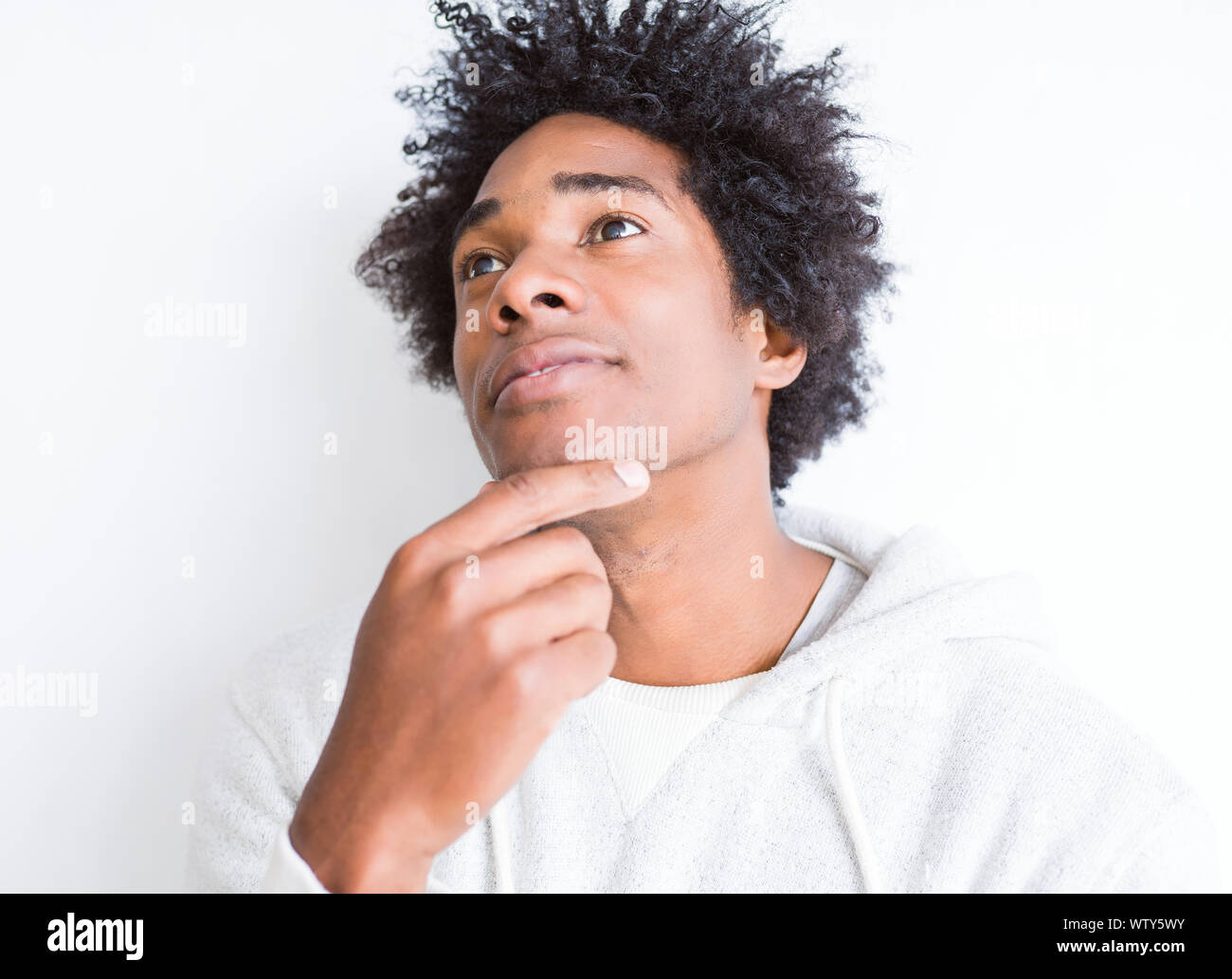 Handsome African American Man With Afro Hair Over White Background