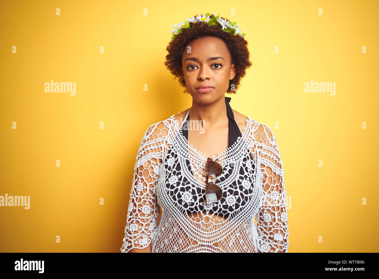 Young African American Woman With Afro Hair Wearing Flowers Crown