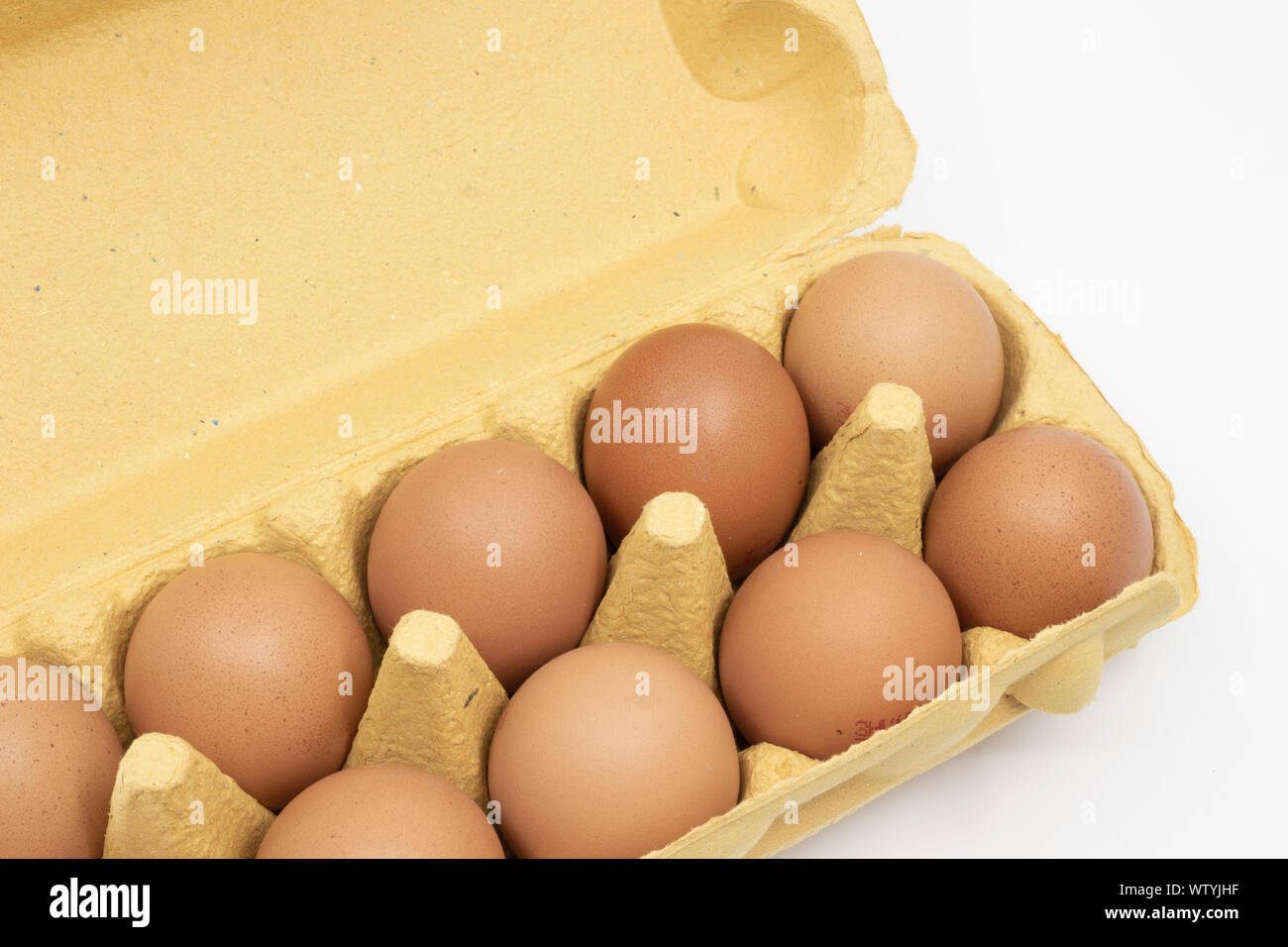 Egg carton with eggs top view Stock Photo
