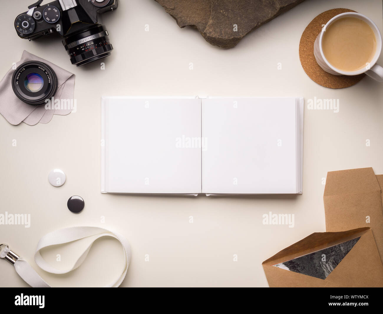 Download Square Photo Book Mockup With Camera And Stationery On A Light Background Stock Photo Alamy PSD Mockup Templates