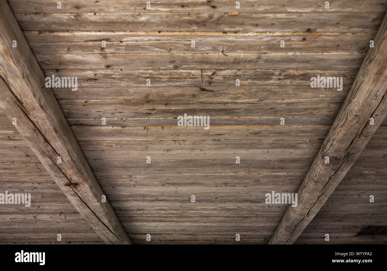 The Ceiling Of An Ancient Building Made Of Wooden Boards And