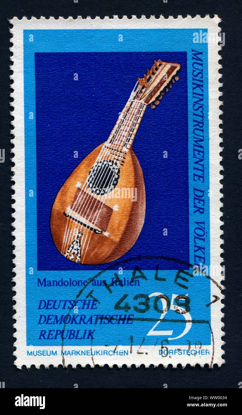 GDR - CIRCA 1971: a stamp printed in GDR shows Mandolin, Italy, Musical Instrument from the Music Museum in Markneukirchen, circa 1971 Stock Photo
