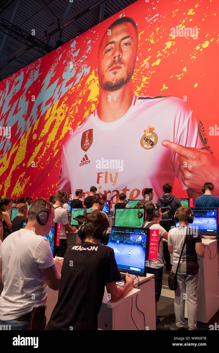 Visitors Play Fifa20 Below Picture Of Real Madrid Player Eden Hazard At Gamescom World S Largest Trade Fair For Computer And Video Games In Cologne Germany On August 21 2019 Stock Photo Alamy