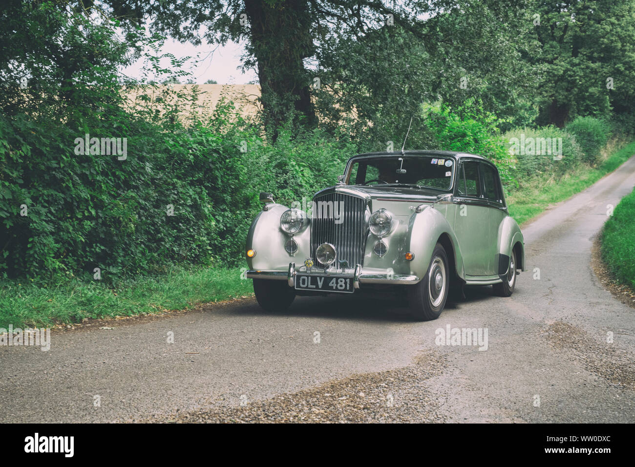 1953 Bentley going to a classic car show in the Oxfordshire countryside. Broughton, Banbury, England. Vintage filter applied Stock Photo