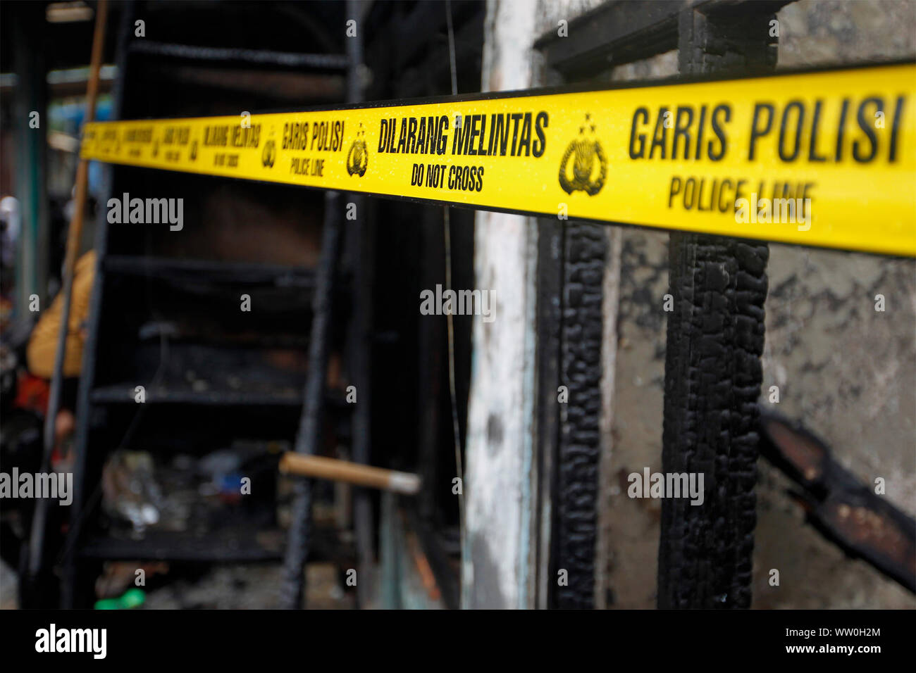 Yellow Police Line Tape Sign High Resolution Stock Photography and ...