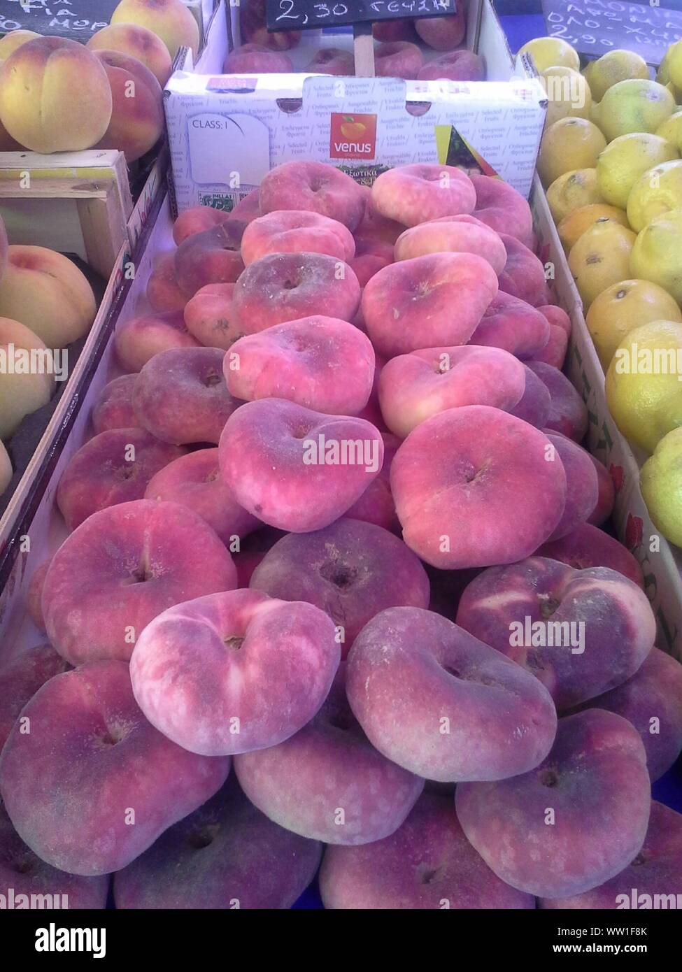 Peach Fruits And Lemons For Sale At Market Stall Stock Photo Alamy