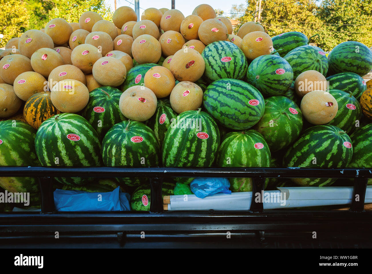Stavros, Greece - August 29, 2019: Closeup view on water melons and yellow melons. On sale across the town during summer season. Stock Photo