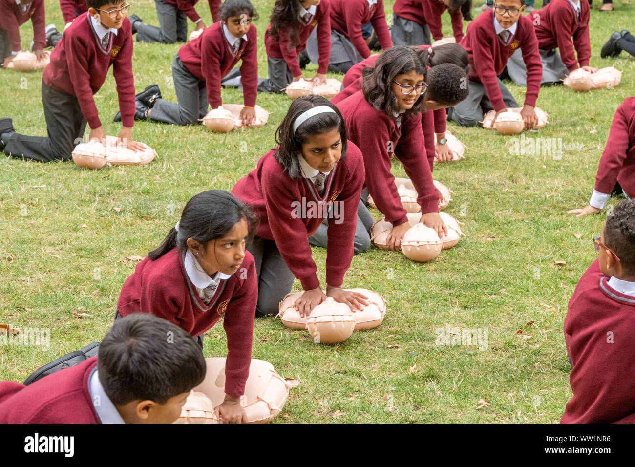 London UK, 12th September 2019 The British Red Cross hosts a demonstration of 100 school children conducting first aid outside the Houses of Parliament to mark the achievement of getting first aid on the school curriculum Credit Ian DavidsonAlamy Live News Stock Photo