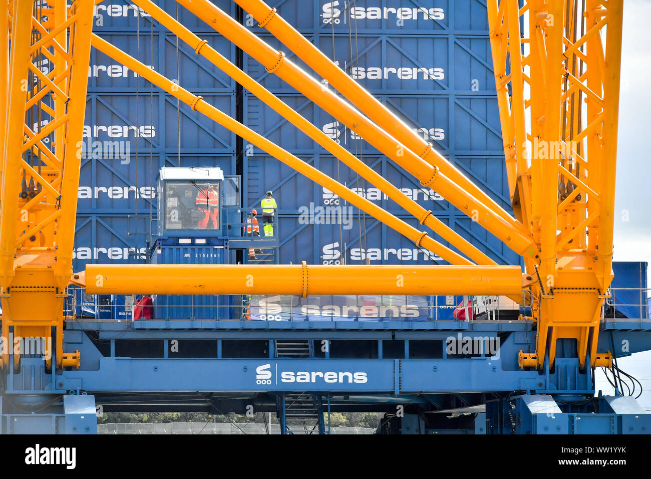 The small cab near base level on-board 'Big Carl', the world's largest crane, which is preparing to begin work at Hinkley Point C power station in Somerset. Able to stand up to 250m tall, the Sarens SCC-250 crane can reach higher than the tallest tower at London's Canary Wharf and can carry 5,000 tonnes in a single lift. Stock Photo