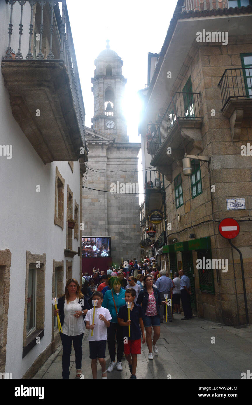 People Leaving the Collegiate Church of Saint Maria in the Old Town of Vigo, North West Spain, EU. Stock Photo
