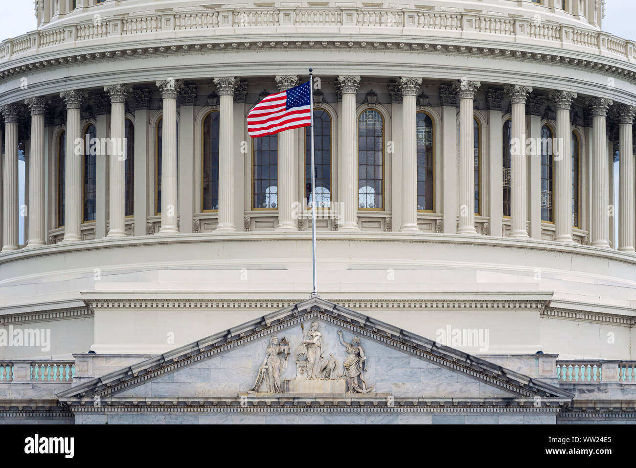 Washington DC Capitol detail with american flag Stock Photo - Alamy