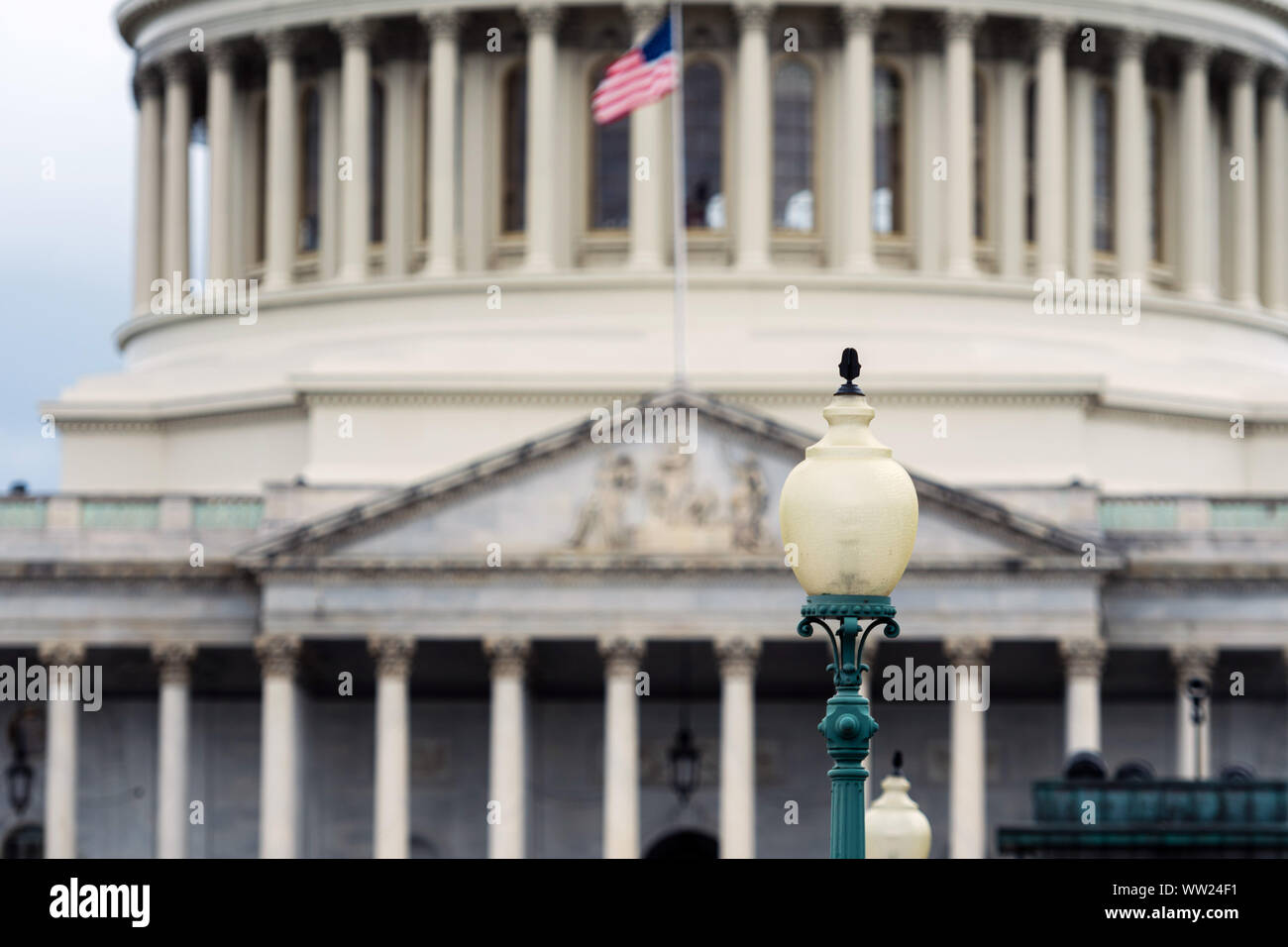 Washington DC Capitol detail with american flag Stock Photo - Alamy