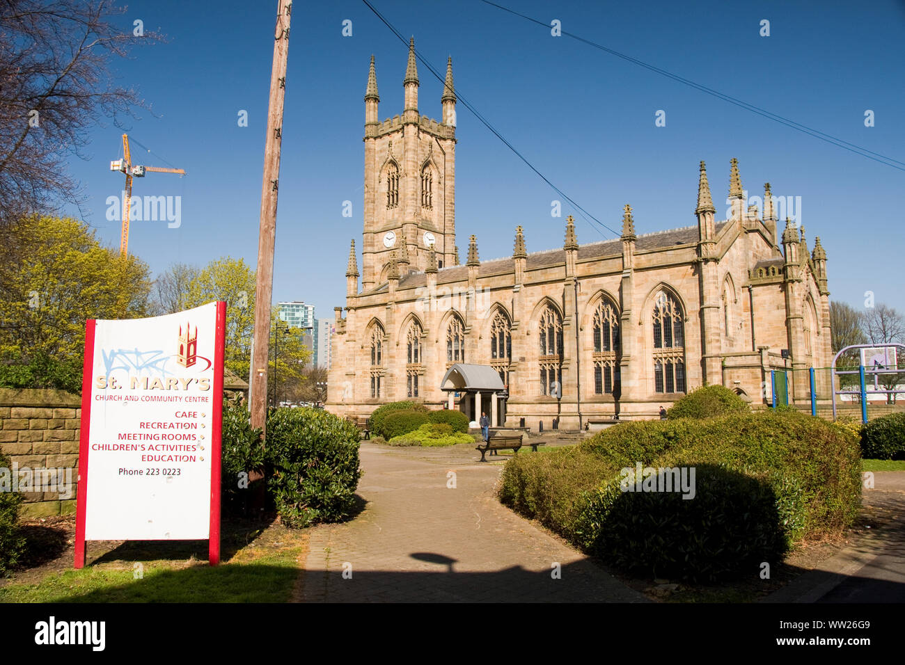 Sheffield, UK: 20 April 2016: St Mary’s church and grounds with Welcome sign from Clough Road Stock Photo