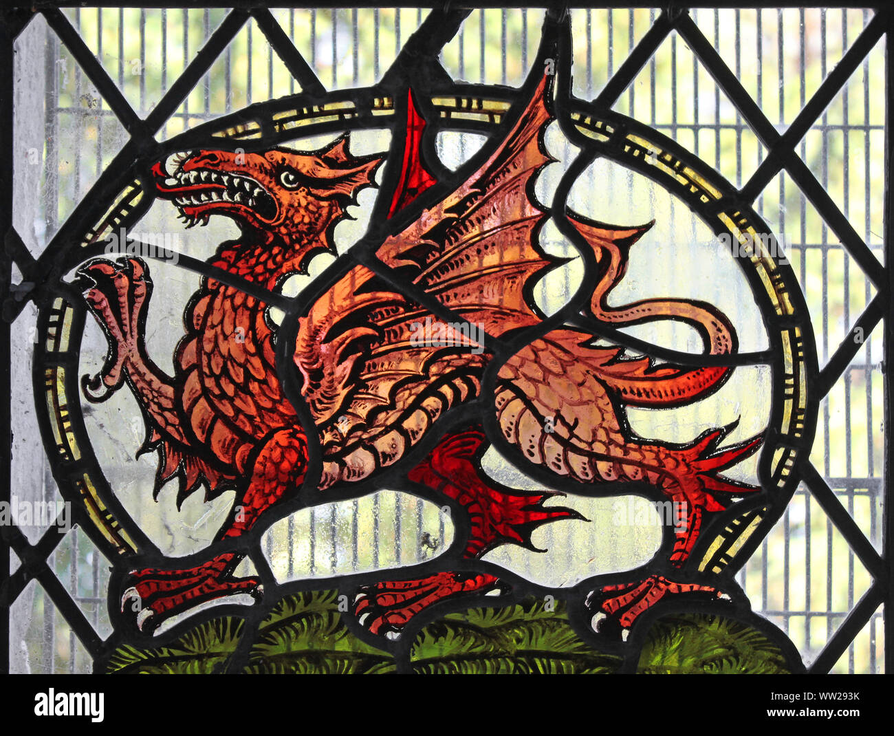 Welsh Dragon Stained Glass Windown in St Gwyddelan's Church, Dolwyddelan, Gwynedd, Wales Stock Photo