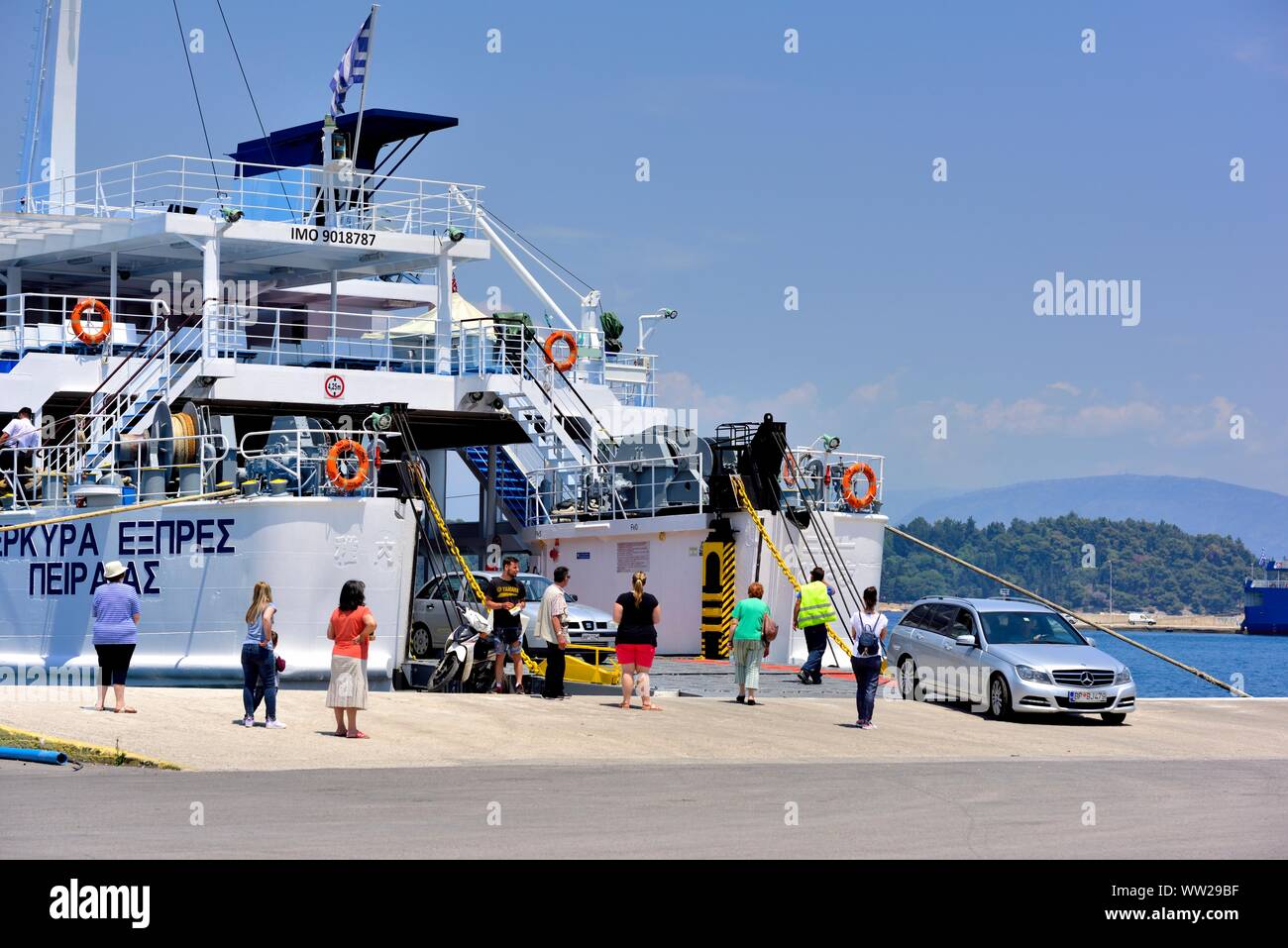 Passengers and cars Disembarking from a ferry in Corfu New Port,Corfu,Kerkyra,Kerkira,Greece,Ionian Islands Stock Photo