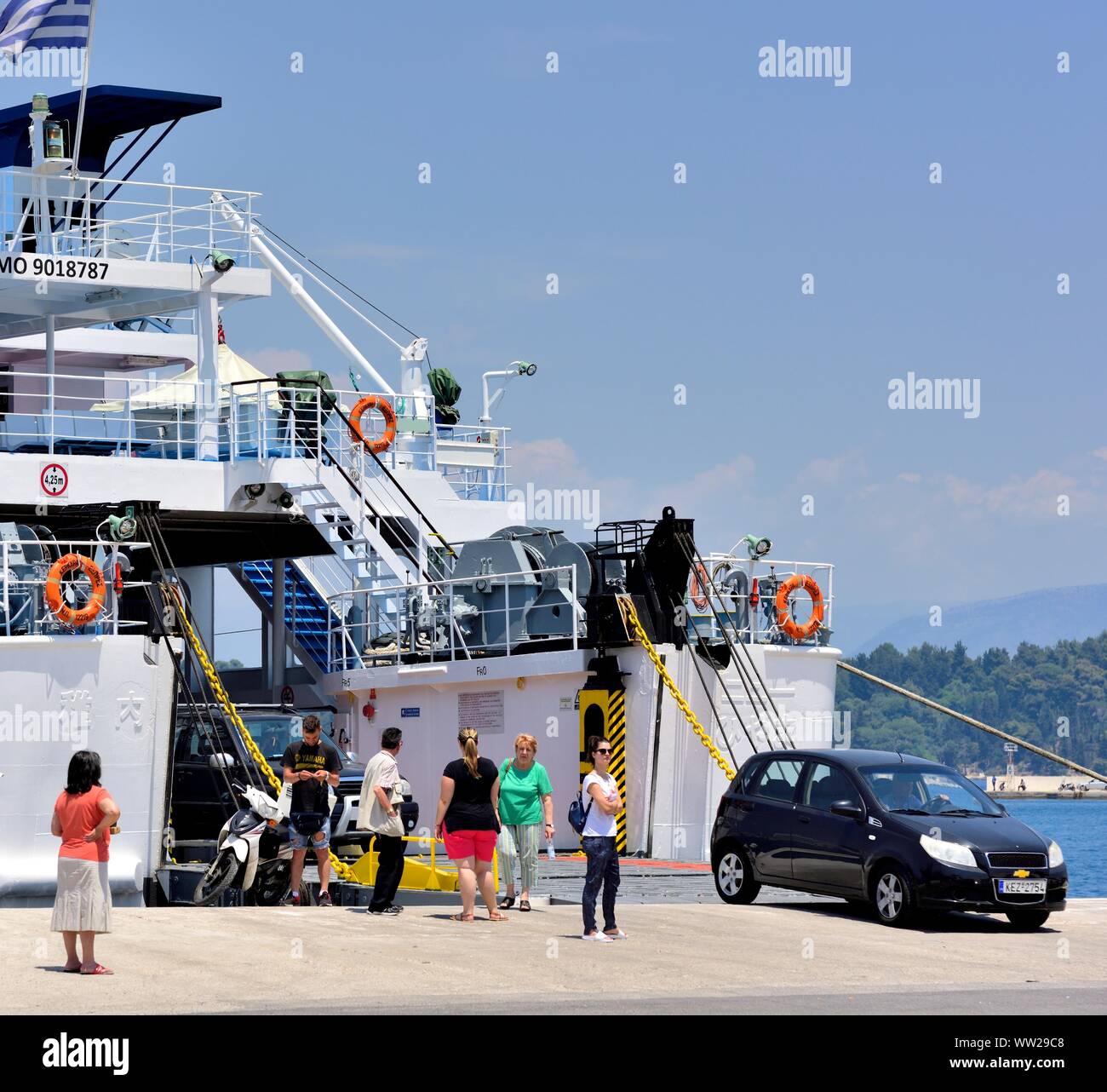 Passengers and cars Disembarking from a ferry in Corfu New Port,Corfu,Kerkyra,Kerkira,Greece,Ionian Islands Stock Photo
