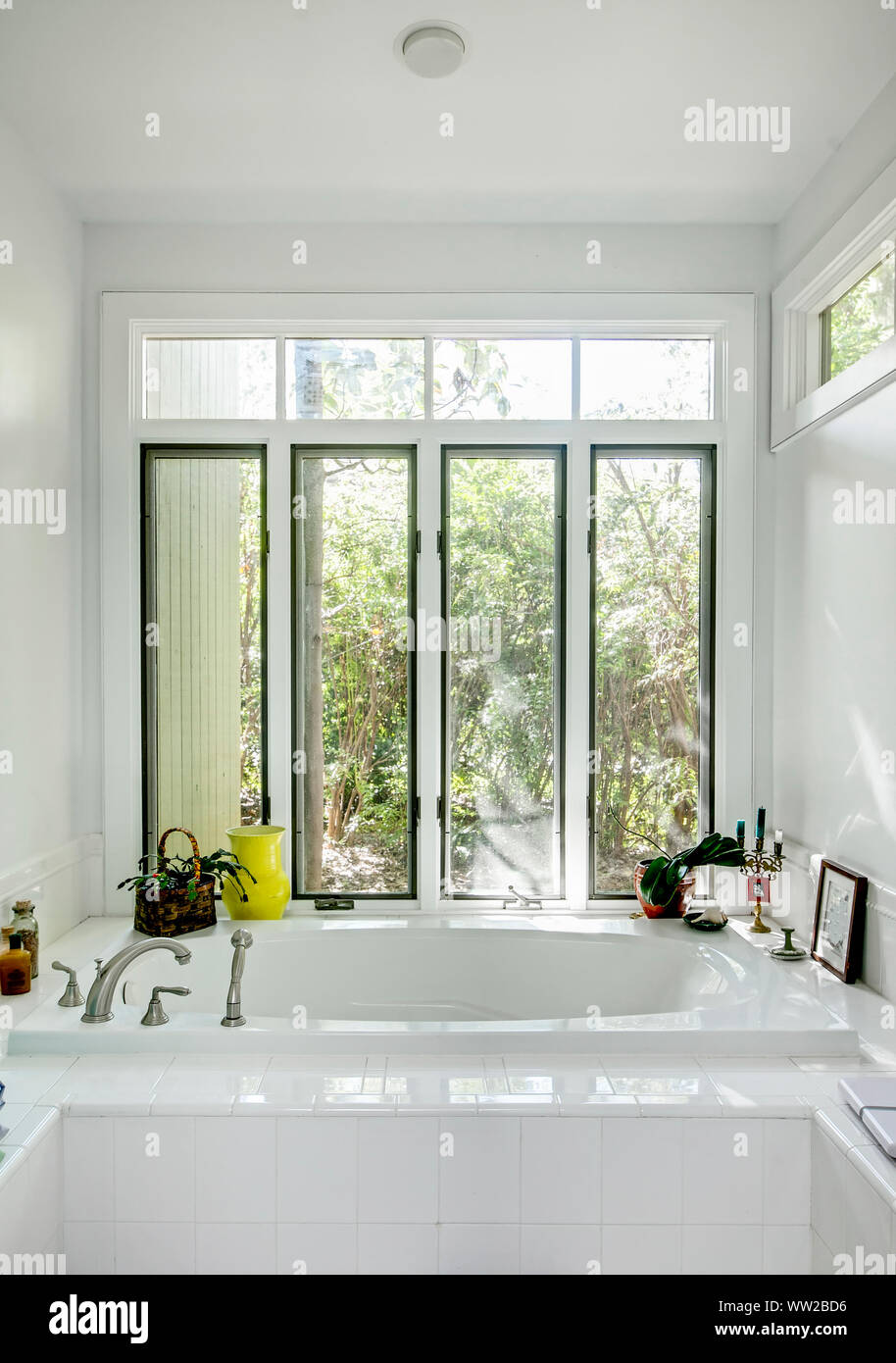 luxury whirlpool bathtub with windows Stock Photo