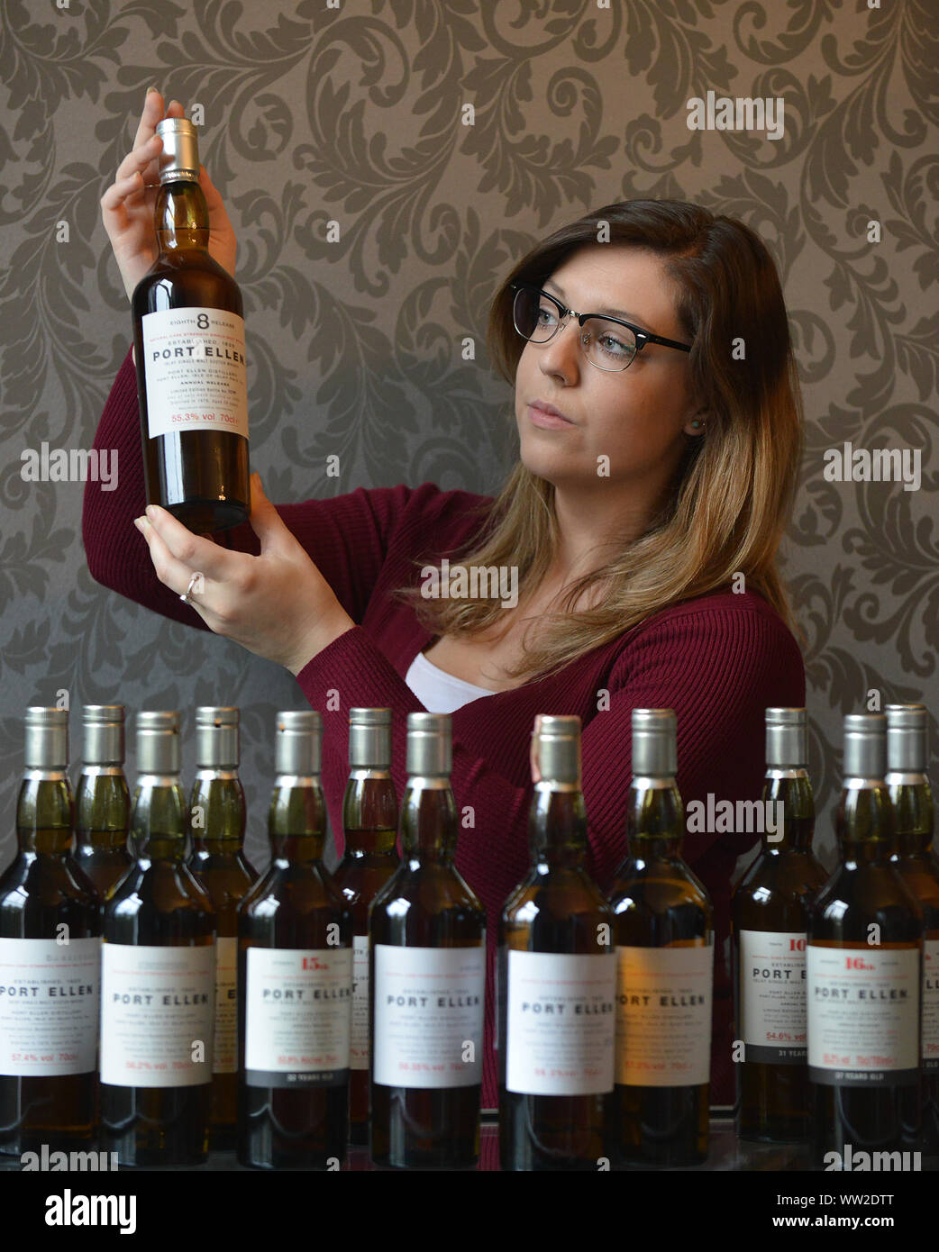 BONHAMS WHISKY SALE   BETHAN KOLLES FROM BONHAMS AUCTIONEERS WITH THE EXCLUSIVE PORT ELLEN  WHISKY COLLECTION DATED FROM 2001-2016 WITH AN ESTIMATED VALUE OF £23,000-£25,000 Stock Photo