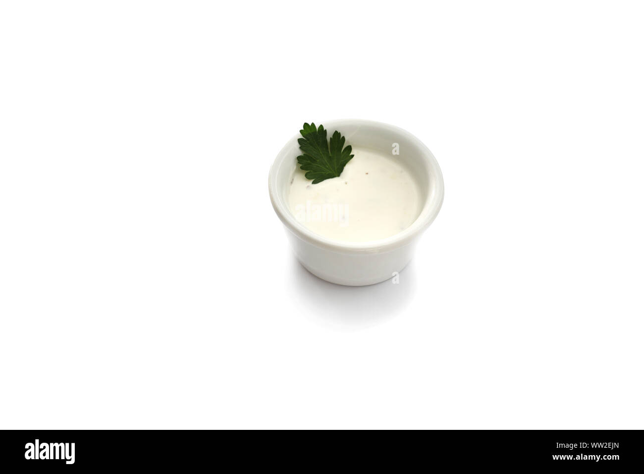 Garlic sauce on a white background. Garlic mayonnaise dip Stock Photo