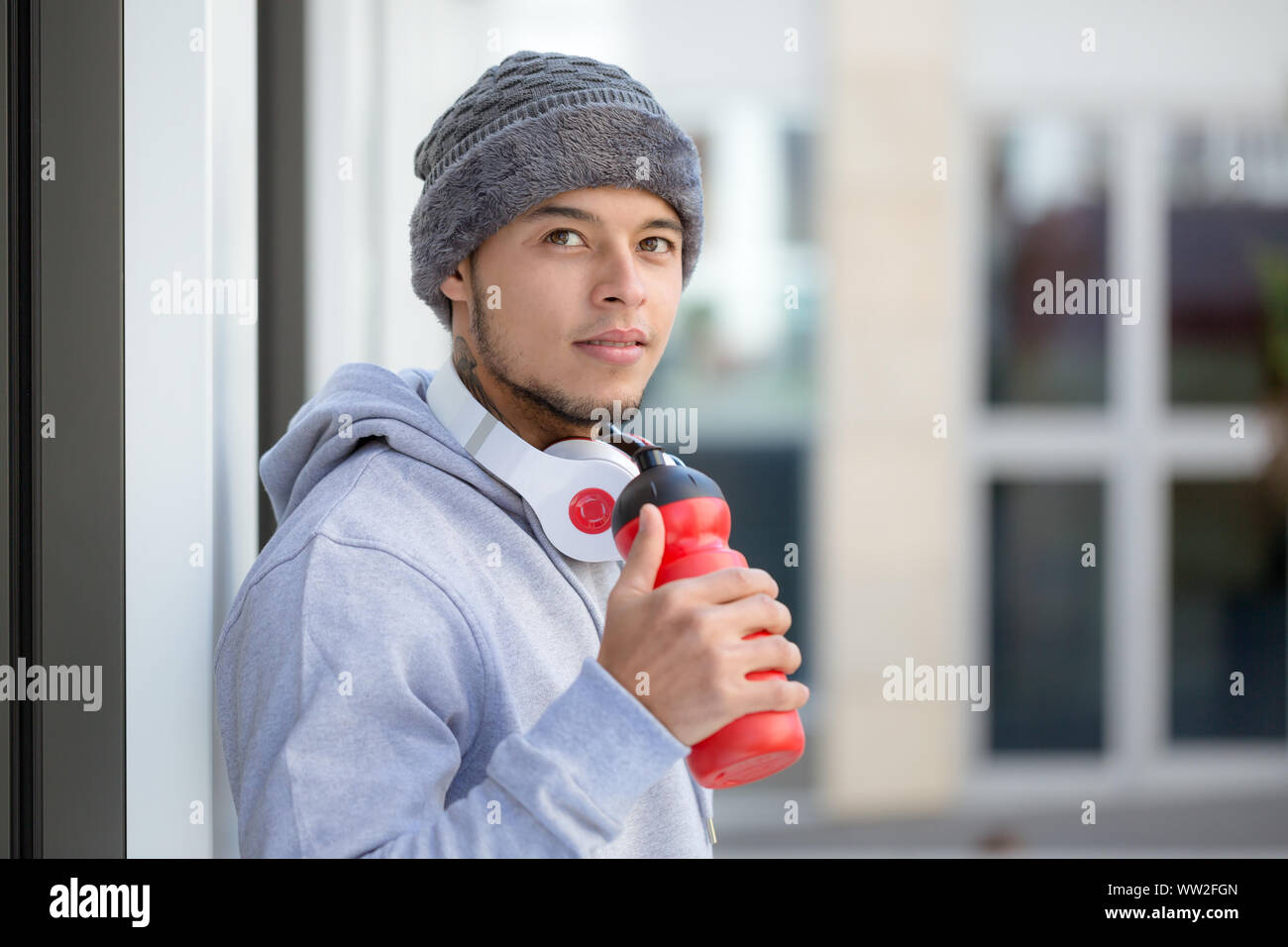 Sports training young latin man thinking emotion runner looking up copyspace copy space outdoor Stock Photo
