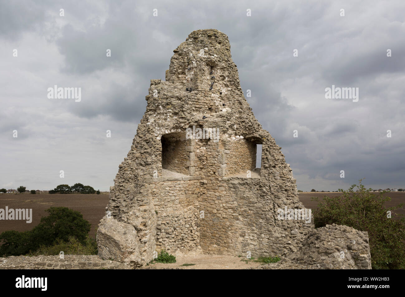 The remains of Hadleigh Castle on 10th September 2019, in Hadleigh, Essex, England. Hadleigh Castle is a ruined fortification in the English county of Essex, overlooking the Thames Estuary from south of the town of Hadleigh. Built after 1215 during the reign of Henry III by Hubert de Burgh, the castle was surrounded by parkland and had an important economic and defensive role. The castle was significantly expanded and remodelled by Edward III, who turned it into a grander property, Stock Photo